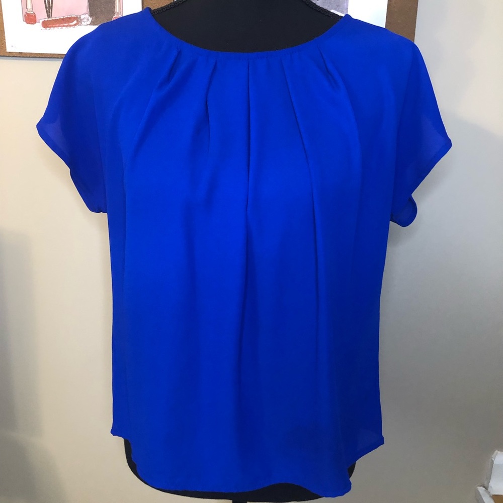 Exquisite open back blouse